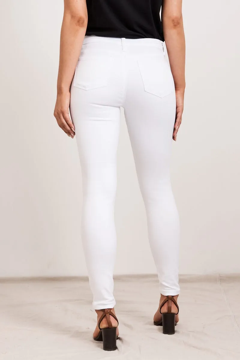 Brooklyn Mid Rise Jeans In White Denim