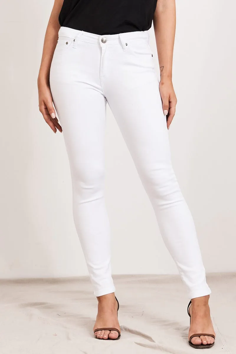 Brooklyn Mid Rise Jeans In White Denim