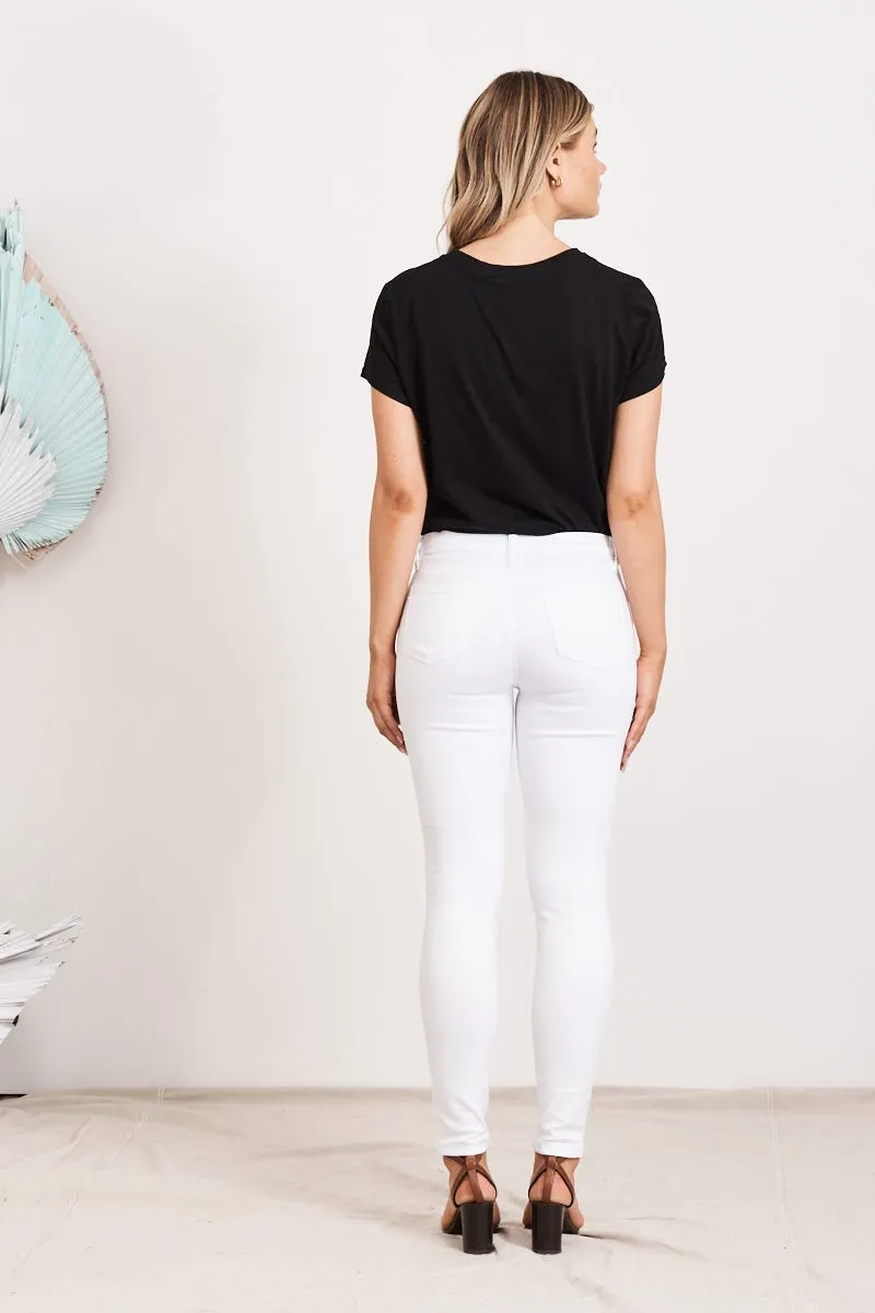 Brooklyn Mid Rise Jeans In White Denim